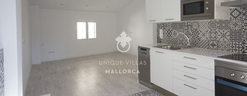uniquevillasmallorca reformed flat for sale in Palma center kitchen:living area
